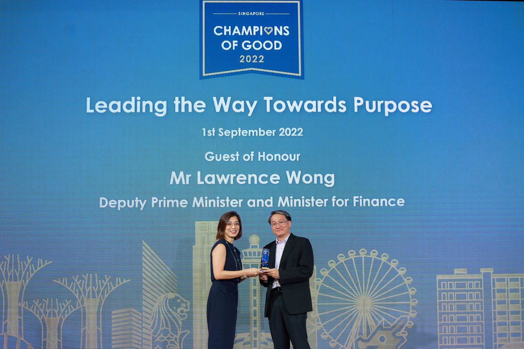 Co-head of Pro-bono practice and Senior Partner Christopher Chong receiving the conferment award from Ms Chong Ee Rong, Vice Chairman of National Volunteer & Philanthropy Centre (NVPC)
